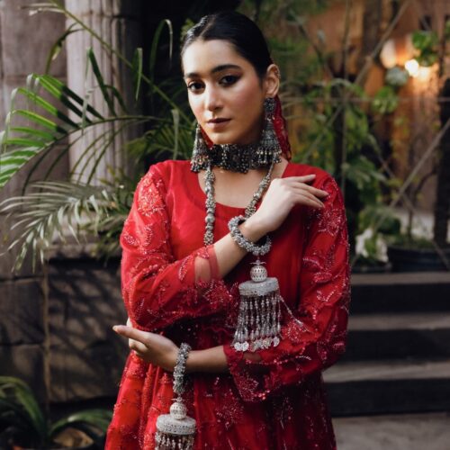 Qasar e Noor Collection 24 Embark on a mesmerizing voyage through time with the “Qasar-e-Noor Collection ’24.” This collection seamlessly fuses the opulent allure of the Mughal era with a contemporary twist, presenting creations that epitomize both enduring classicism and modern sophistication. With utmost precision and care, each piece encapsulates a narrative steeped in rich heritage, resonating with the lavish opulence that once graced the illustrious courts of ancient India. Immerse yourself in this enchanting fusion of history and refinement, where every jewel narrates a tale of unparalleled beauty and artistry.