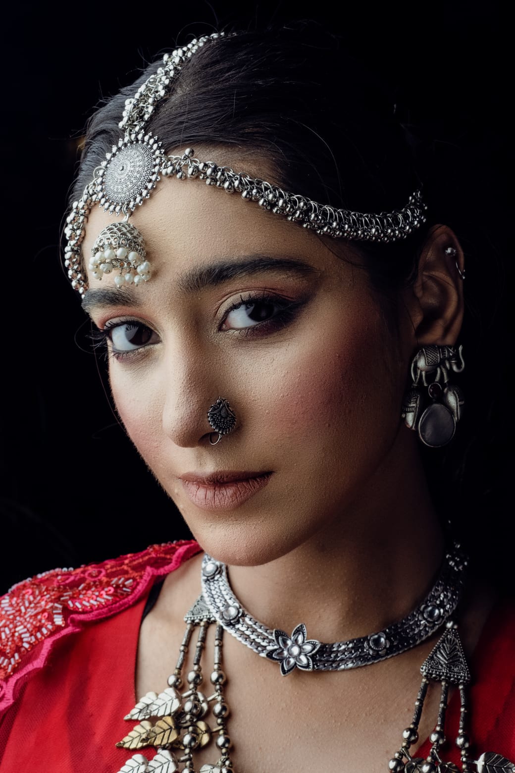 Embark on a mesmerizing voyage through time with the “Qasar-e-Noor Collection ’24.” This collection seamlessly fuses the opulent allure of the Mughal era with a contemporary twist, presenting creations that epitomize both enduring classicism and modern sophistication. With utmost precision and care, each piece encapsulates a narrative steeped in rich heritage, resonating with the lavish opulence that once graced the illustrious courts of ancient India. Immerse yourself in this enchanting fusion of history and refinement, where every jewel narrates a tale of unparalleled beauty and artistry.