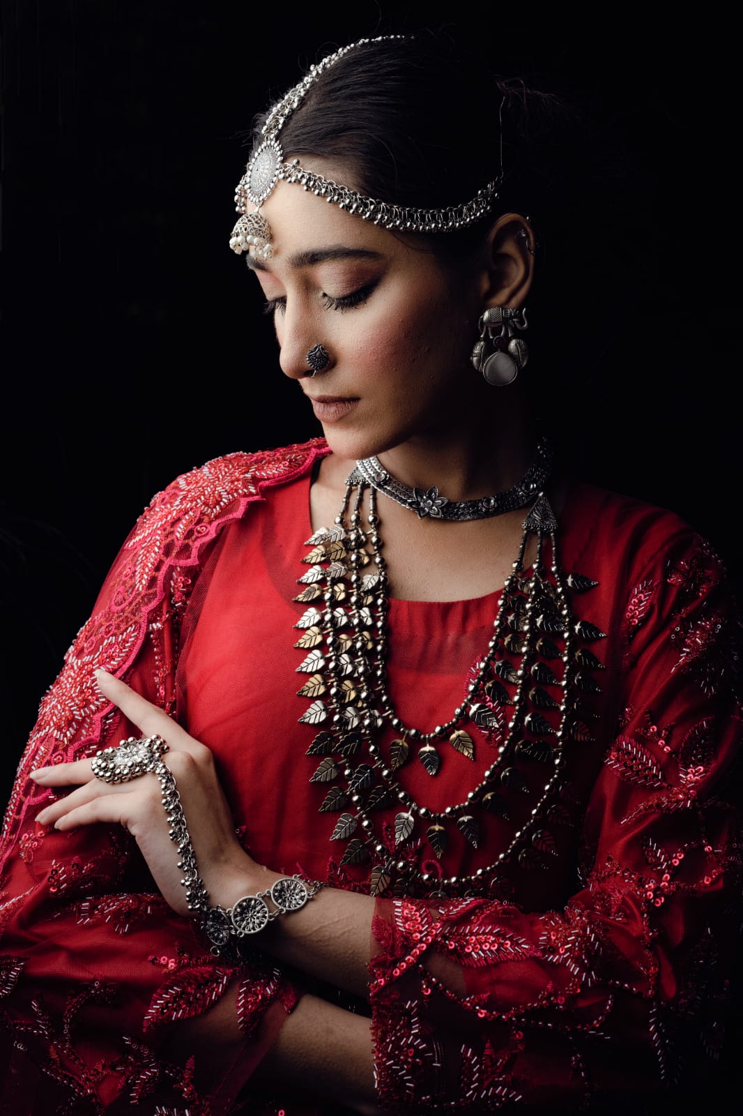 Embark on a mesmerizing voyage through time with the “Qasar-e-Noor Collection ’24.” This collection seamlessly fuses the opulent allure of the Mughal era with a contemporary twist, presenting creations that epitomize both enduring classicism and modern sophistication. With utmost precision and care, each piece encapsulates a narrative steeped in rich heritage, resonating with the lavish opulence that once graced the illustrious courts of ancient India. Immerse yourself in this enchanting fusion of history and refinement, where every jewel narrates a tale of unparalleled beauty and artistry.