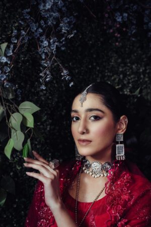 Embark on a mesmerizing voyage through time with the “Qasar-e-Noor Collection ’24.” This collection seamlessly fuses the opulent allure of the Mughal era with a contemporary twist, presenting creations that epitomize both enduring classicism and modern sophistication. With utmost precision and care, each piece encapsulates a narrative steeped in rich heritage, resonating with the lavish opulence that once graced the illustrious courts of ancient India. Immerse yourself in this enchanting fusion of history and refinement, where every jewel narrates a tale of unparalleled beauty and artistry.