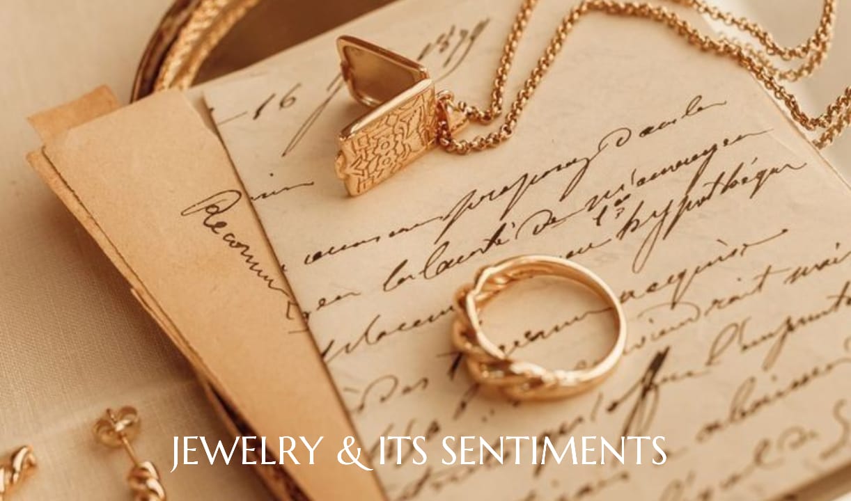 Golden ring with a Necklace on Piece of paper
